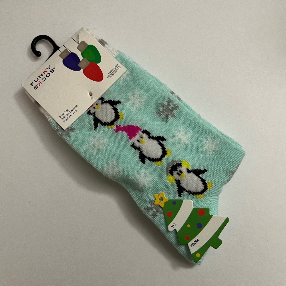NWT Winter-themed Funky Socks with a Penguin and Snowflake Design